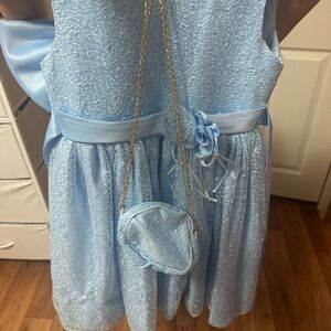 Elegant Light Blue Dress with Matching Purse